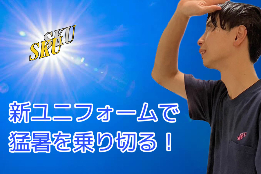 夏用制服を着用したスタッフの写真